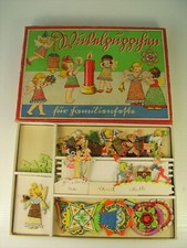 Antikes Spiel Wickelpüppchen